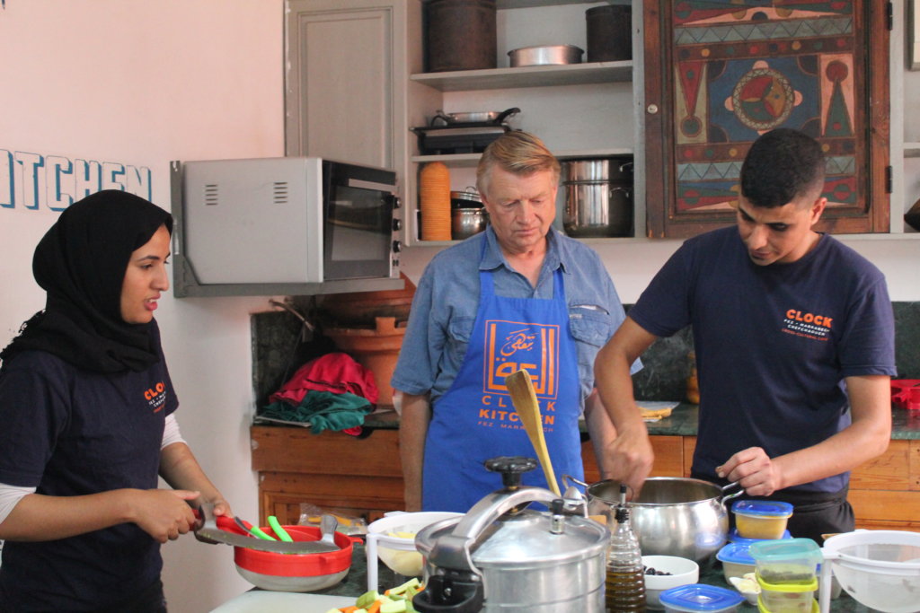 This photo shows Mark with the chef at Cafe Clock