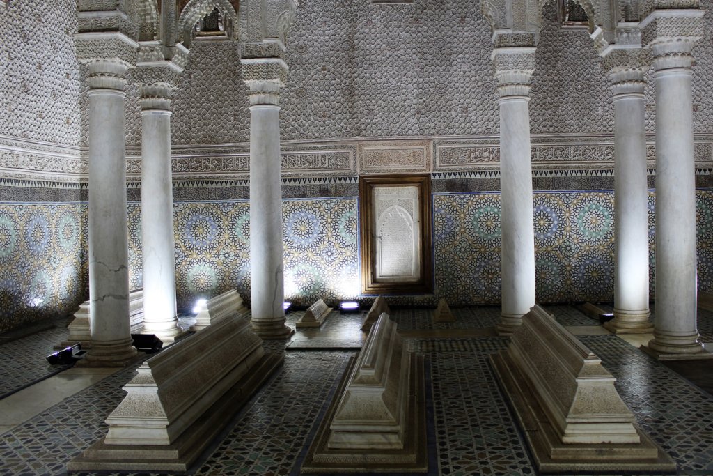 This photo shows the interior of the mausoleum with its white marble pillars and highly decorative walls