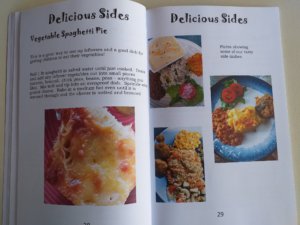 This photo shows a double page of the Boathouse cookbook with a recipe for vegetable spaghetti pie and photos of side dishes