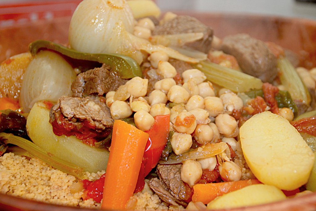 THis picture shows a dish of couscous and vegetables