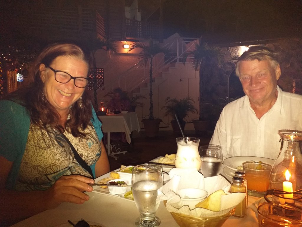 This photo shows two people sitting at a table