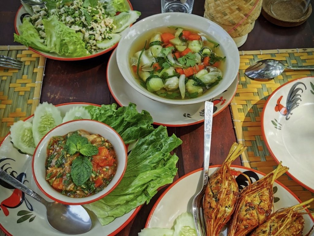 This photo shows a selection of delicious Laotian dishes