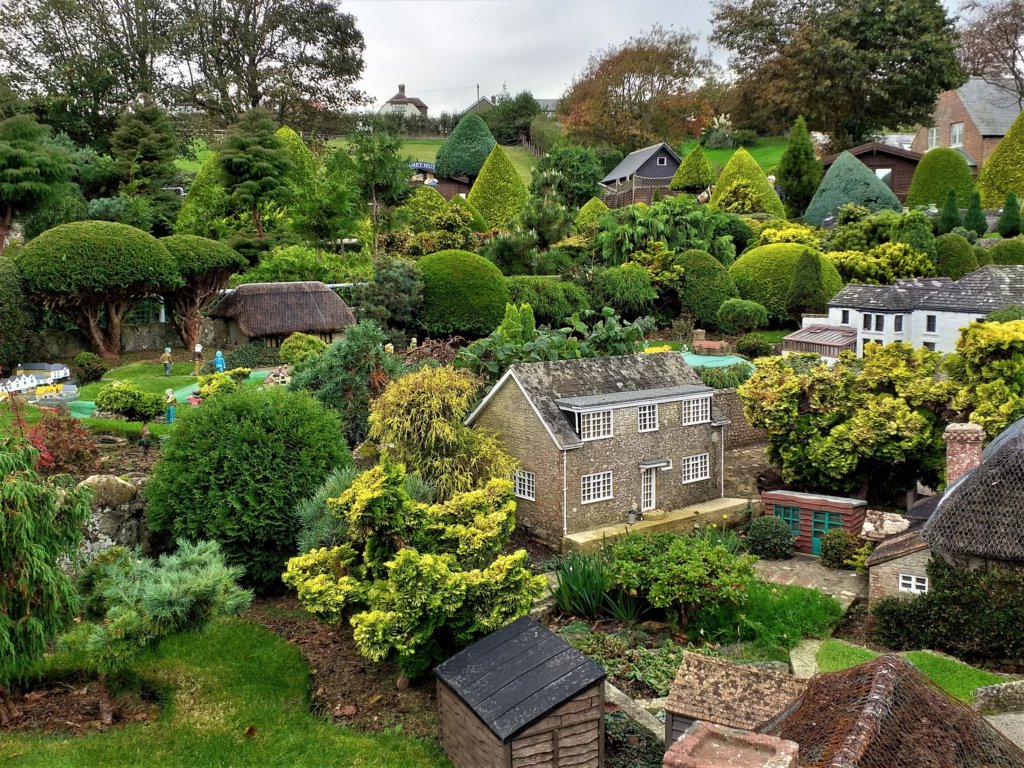 This photo shows some of the stone-built models of houses and cottages set in miniature landscaped gardens