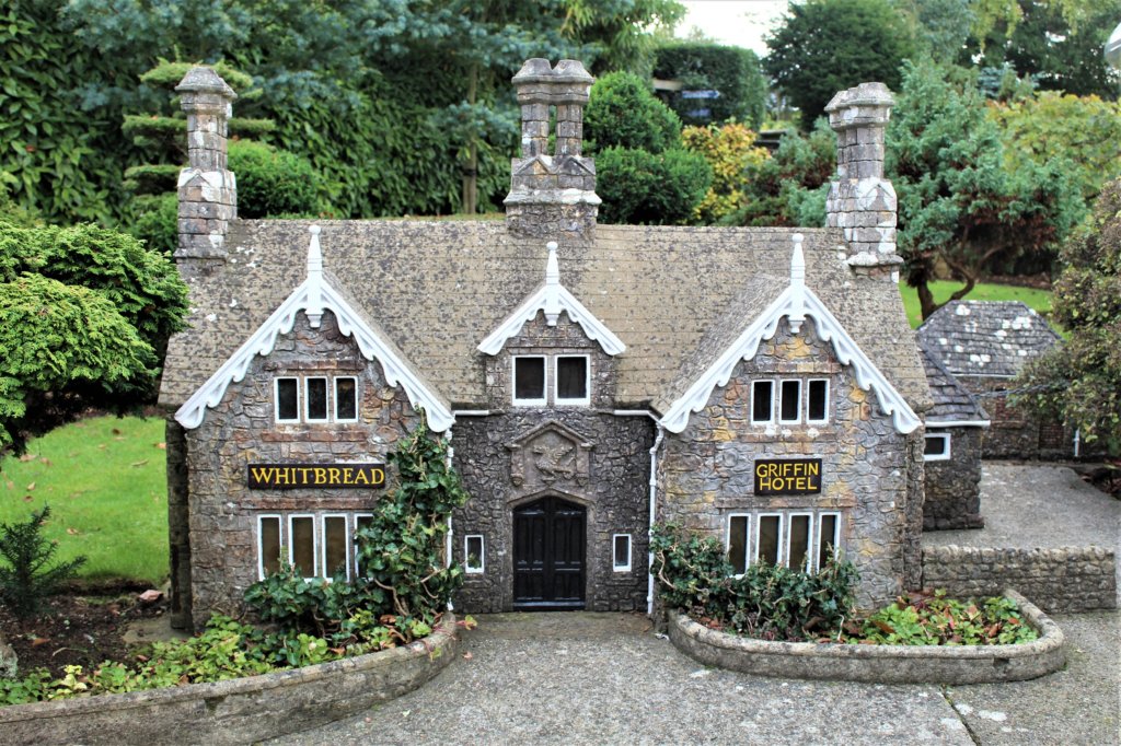 Thisnphoto shows a model pf the twin-gabled stone-built village hotel