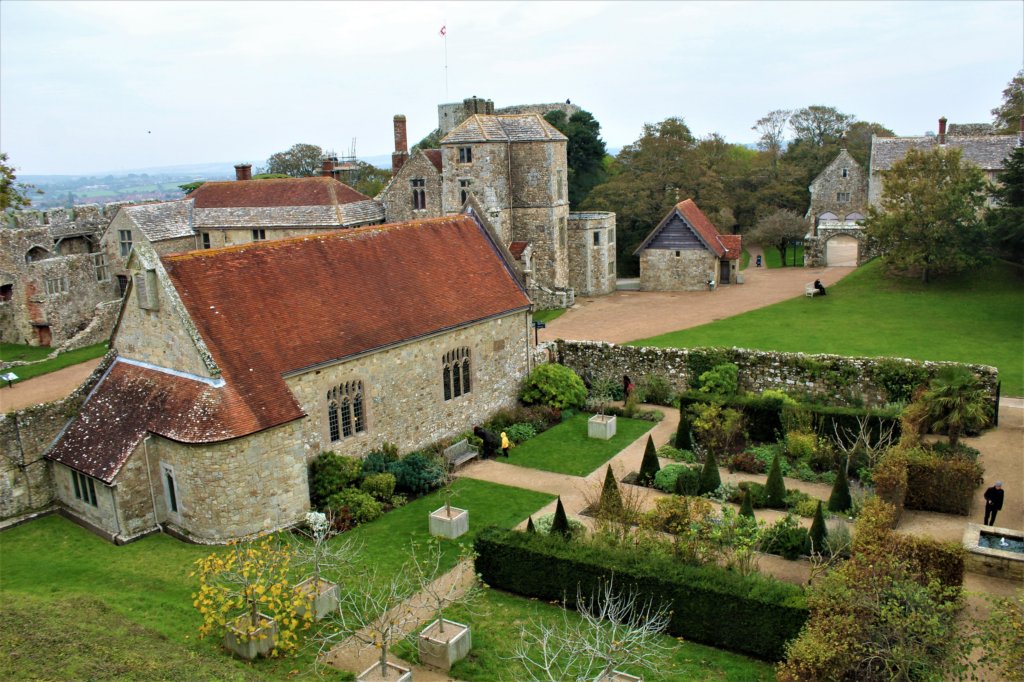 This photo was taken from the castle walls looking down on the stone chapel and lush green garden.