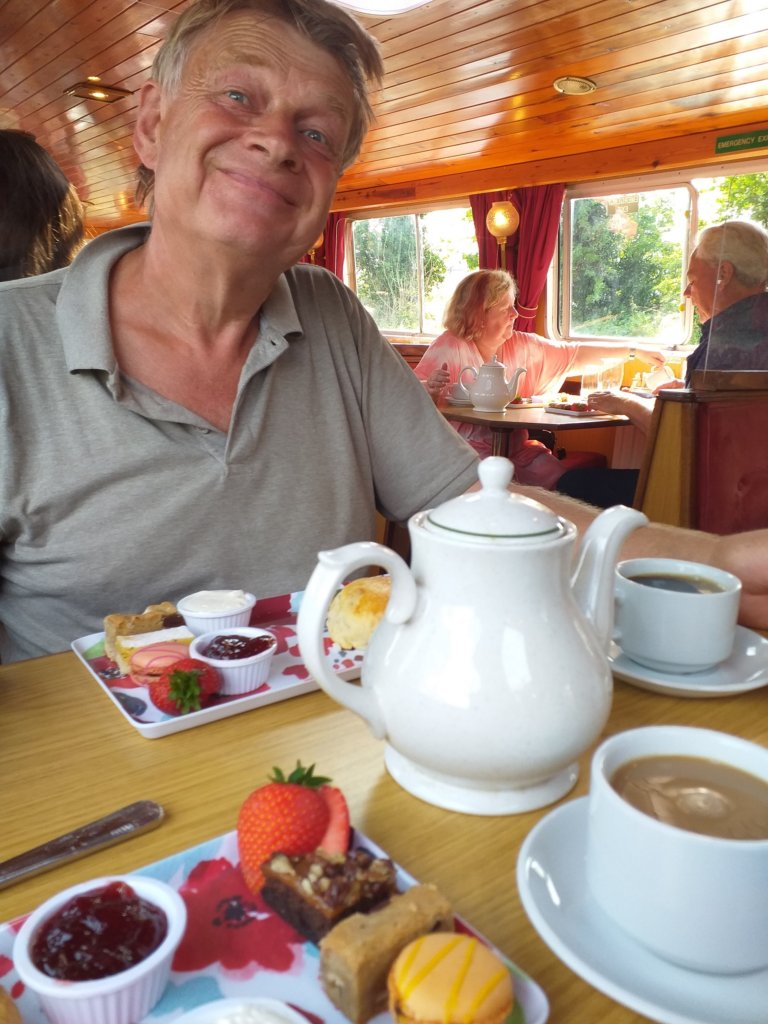 This photo shows my husband, Mark, enjoying his afternoon tea