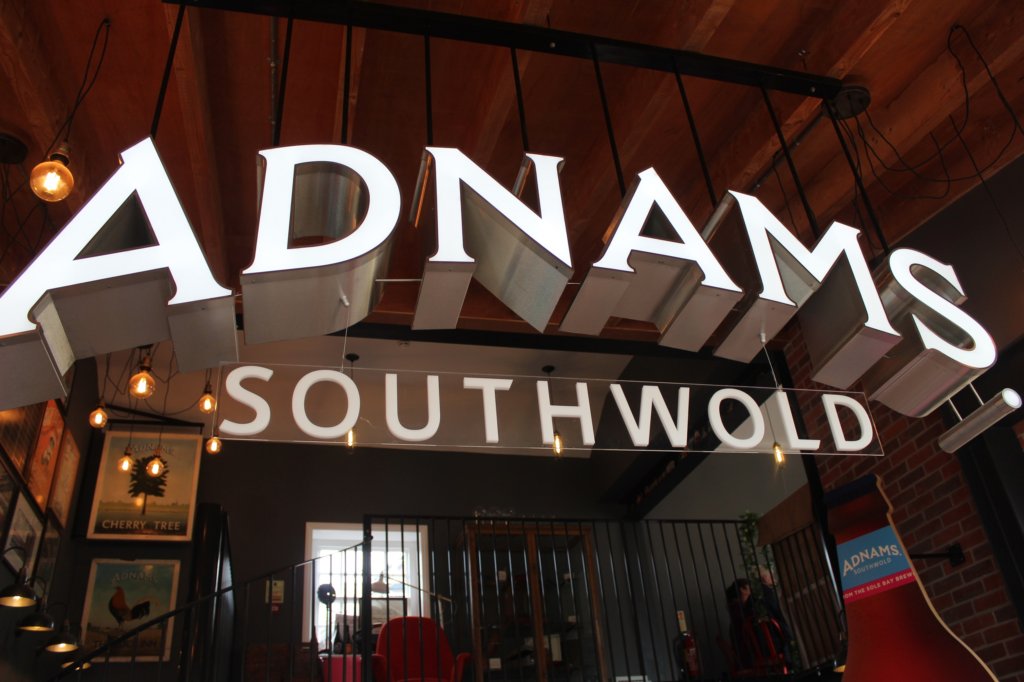 This photo shows the entrance to the visitor centre at Adnams Brewery