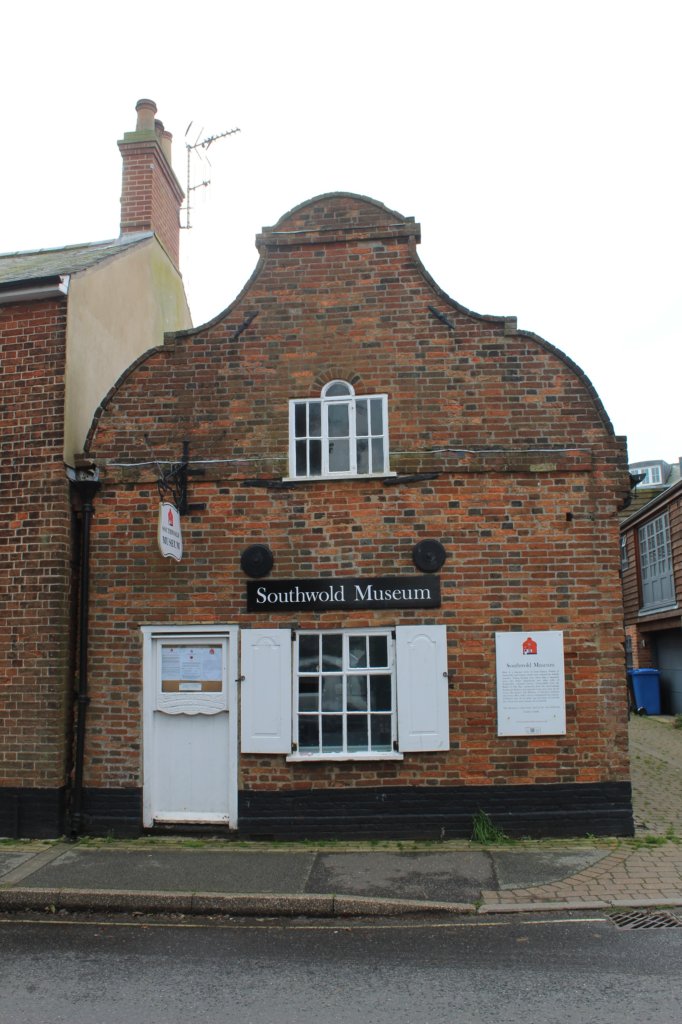 This photo shows the museum built in the Dutch style with a decorative gable end.