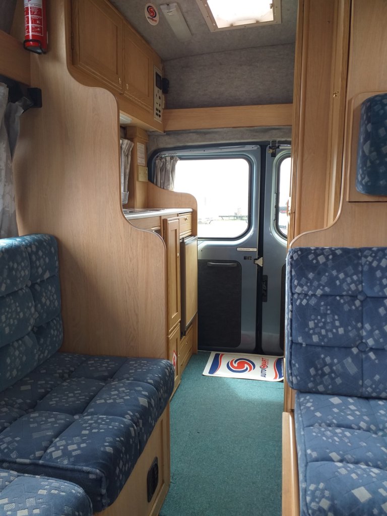 This photo shows the inside of our campervan before we bought her