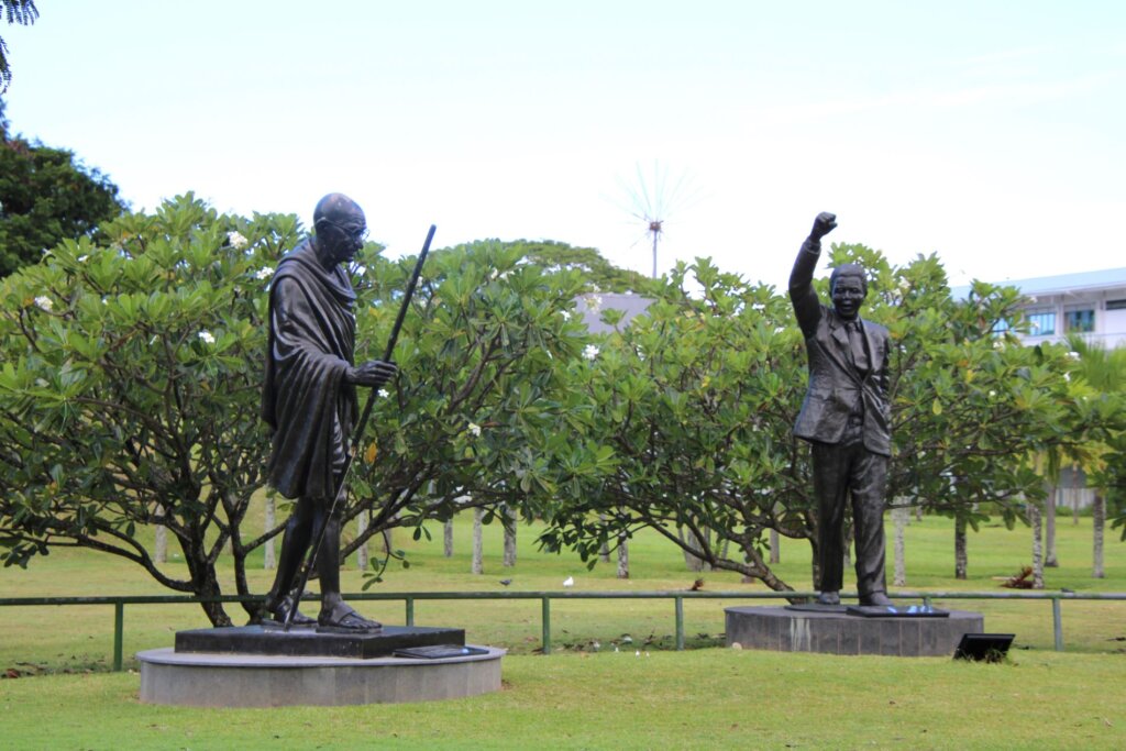 This photo shows statues of Ghandi and Nelson Mandela